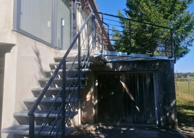Aménagement extérieur en pierre et grès cérame